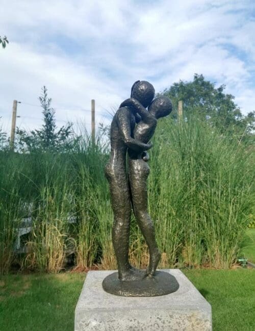 Abstract and Modern Bronze Sculpture of Embracing Couple Kissing Couple